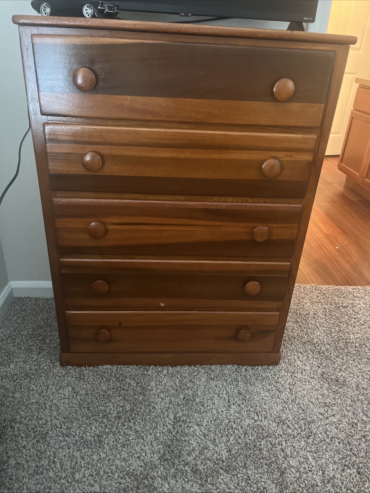 wooden dresser, nothing wrong with It, just not the color I want
