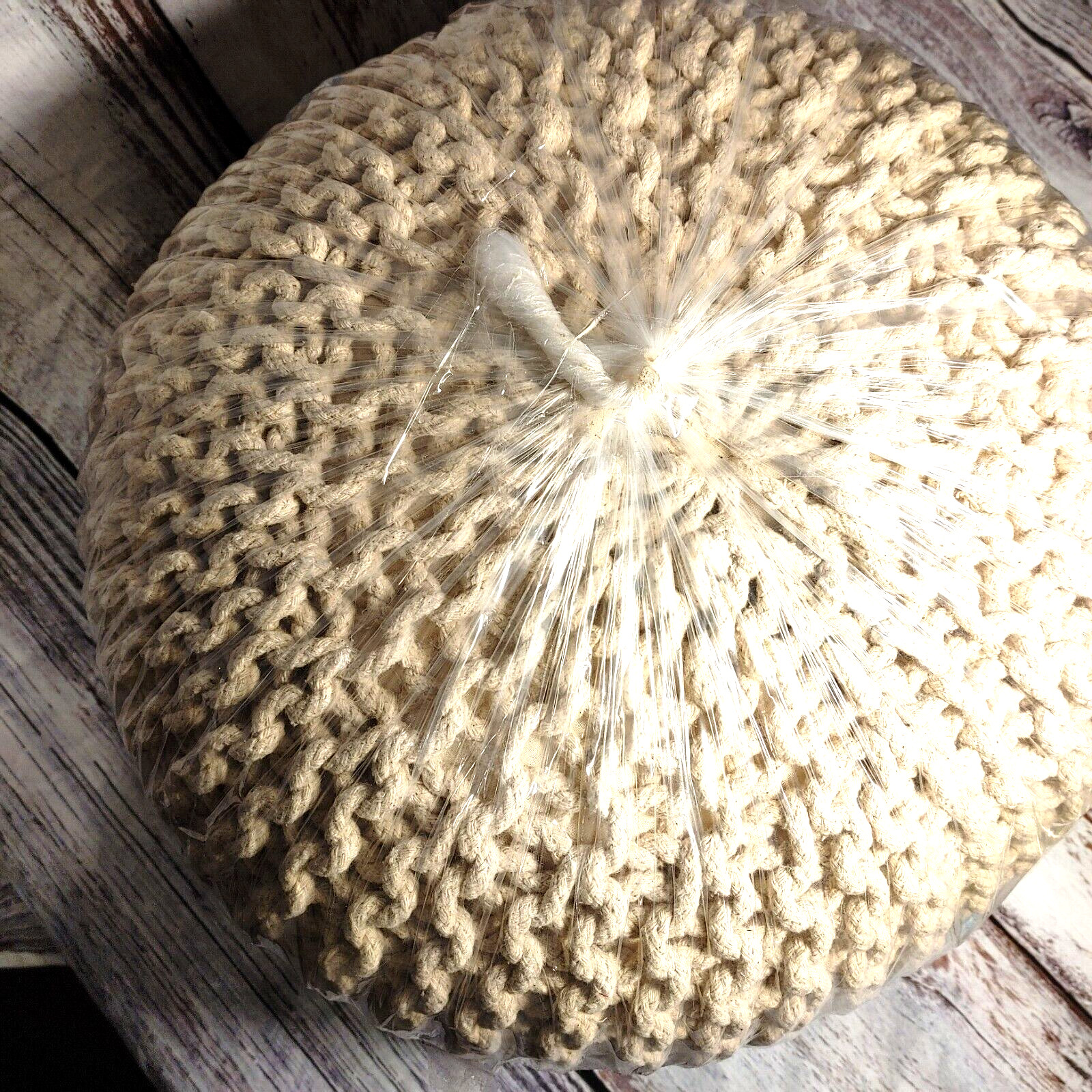 Foot Spool, braided rope, firm, tan, filled with 100% poly, covered 100% cotton.