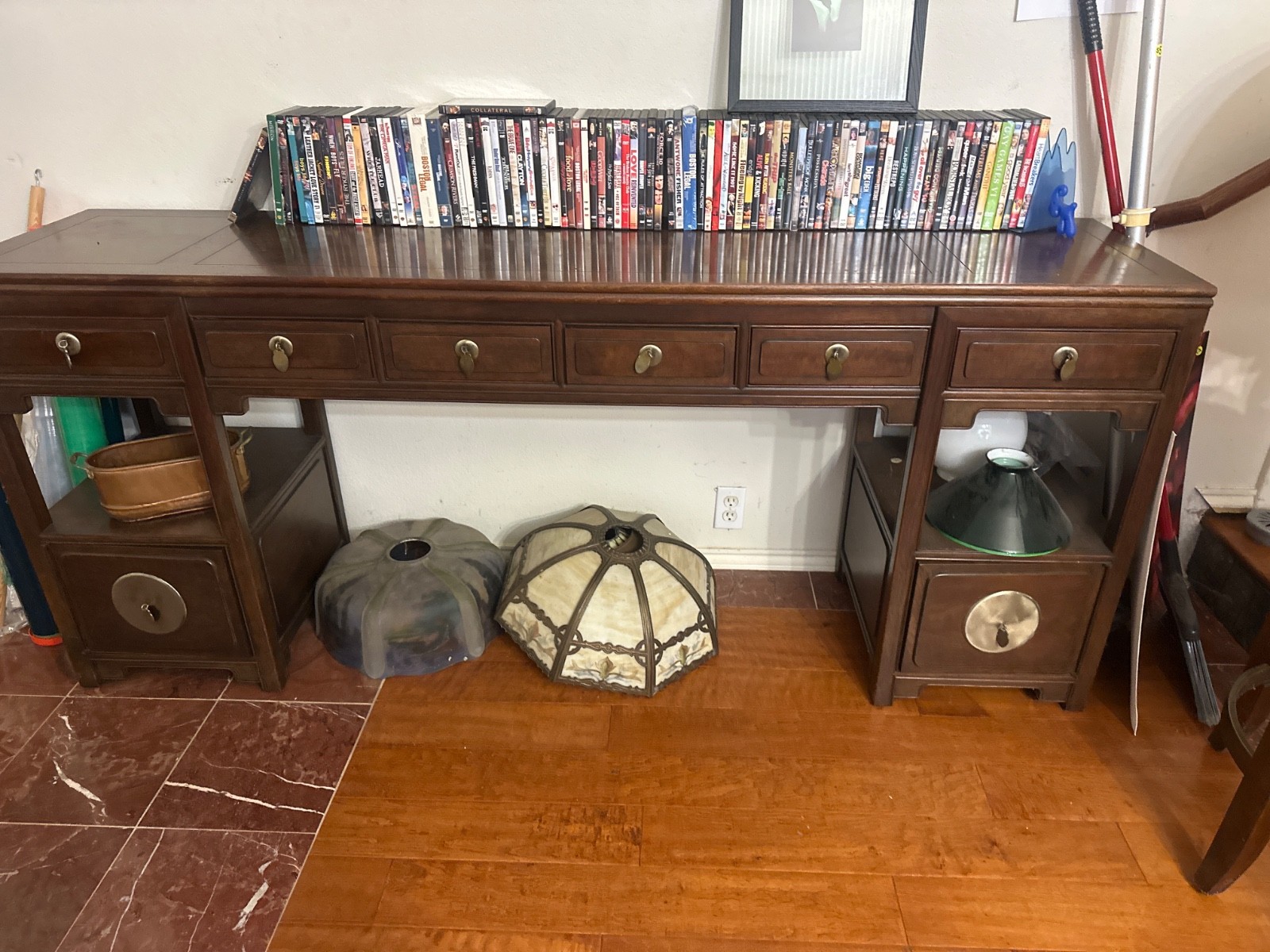 sofa table with oriental style pull tabs on the drawers. Six drawer unit.