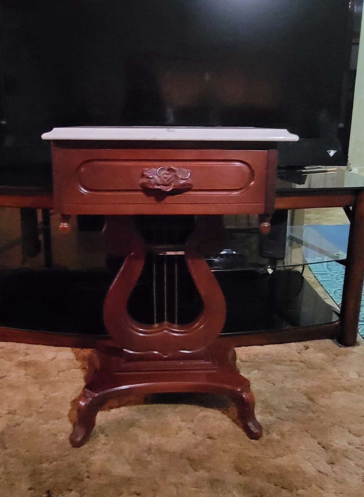 Brown Wood Rectangular End/Side Table, Marble-White Top and a painting. ￼