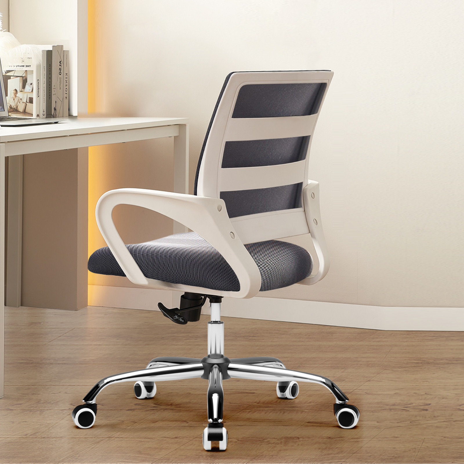 Ergonomic office chair with mid-back cushion, lumbar support, and casters