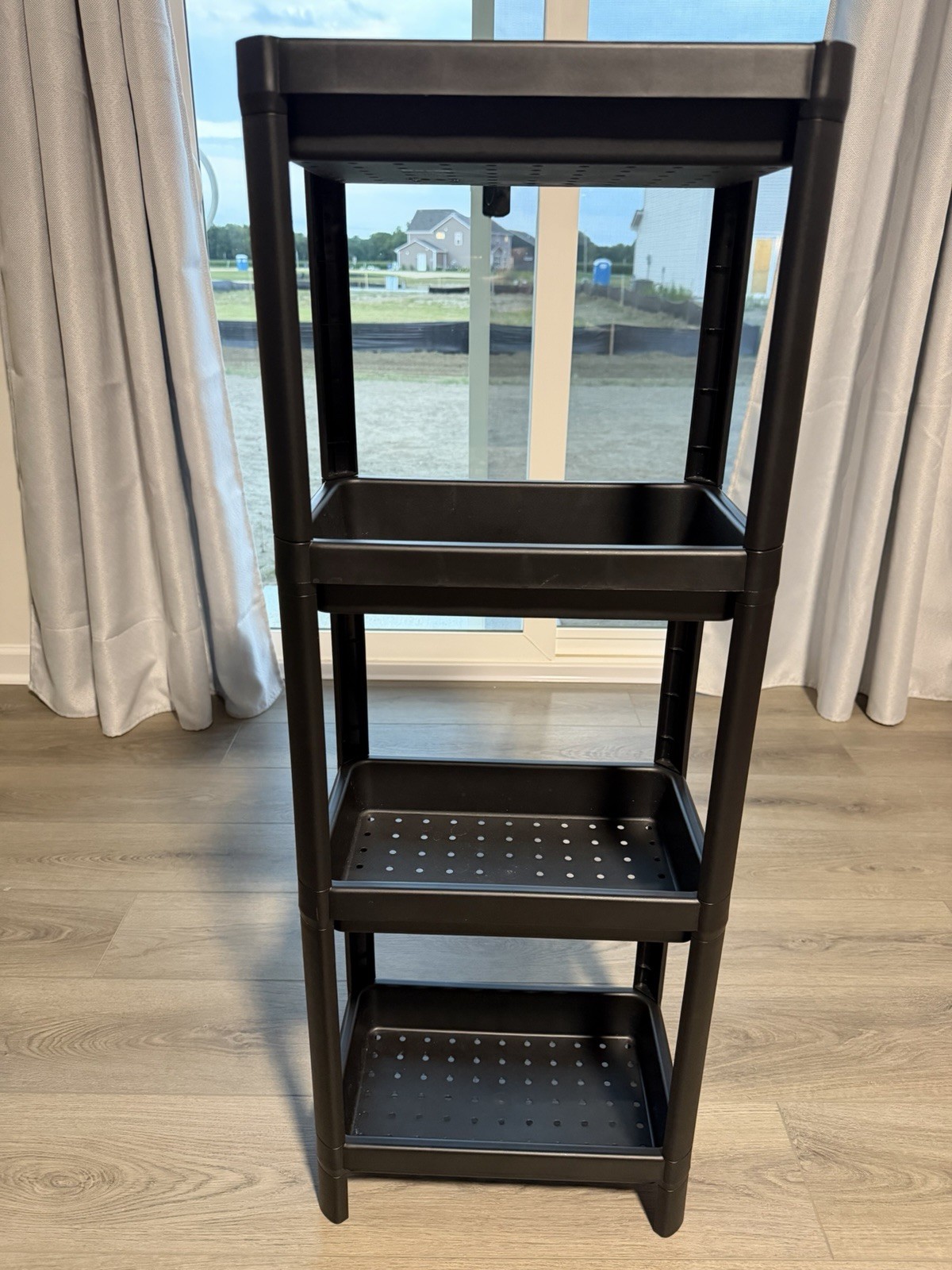 Black Plastic 4-Shelf Freestanding Rectangular Shelf Unit 45x19x12 in