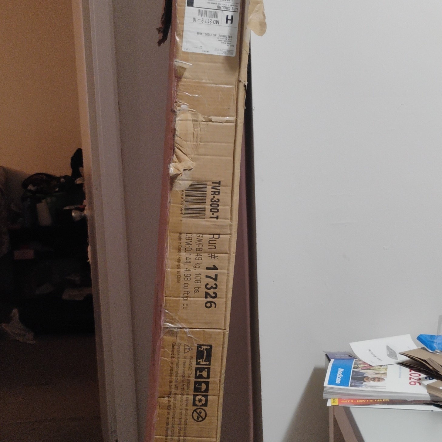 Boxed Television Stand Needs Assembly Instructions in box