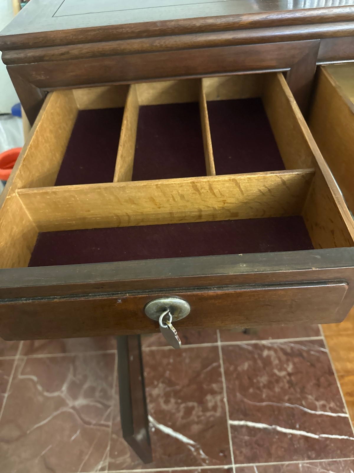 sofa table with oriental style pull tabs on the drawers. Six drawer unit.