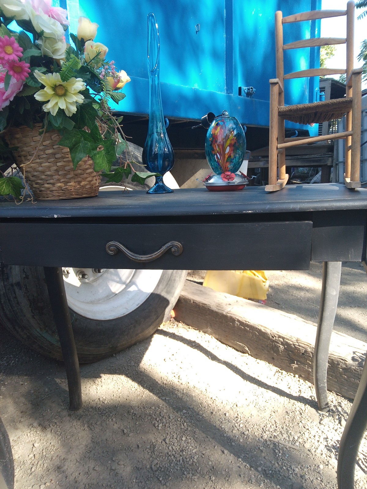 Antique Table with a sliding drawer in great condition