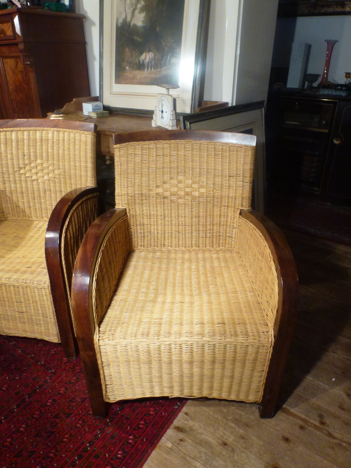 a pair of club chairs in colonial style, rattan hand woven