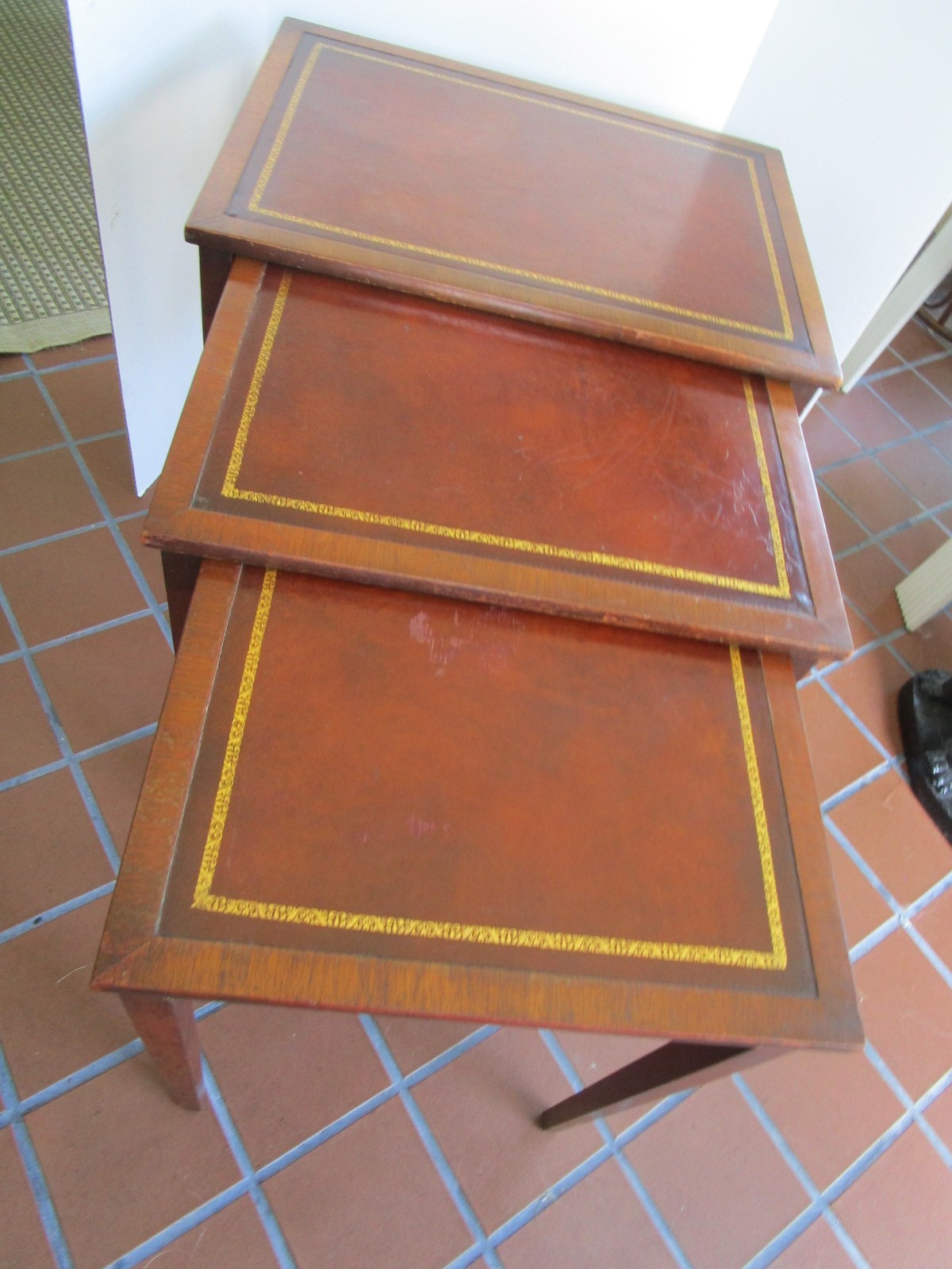 Vintage 3-Nesting Side Tables Mahogany Wood Tooled Leather tops 21″ to 22.75″ T